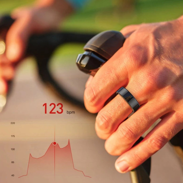 Heart rate monitor with smartphone app displaying heart rate data, used for health tracking.